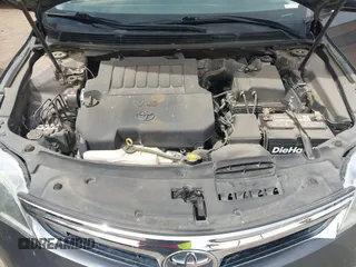 2014 Toyota Avalon Limited with VIN 4T1BK1EB1EU101787, listed as a IAAI auction lot 41949977 with 137,837 mi miles. Bid and sale history available at carsss.com. Image 10.
