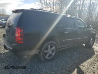 2014 Chevrolet Suburban LTZ with VIN 1GNSCKE08ER230741, listed as a Copart auction lot 47234095 with 184,263 mi miles and Salvage title. Bid and sale history available at DreamBid. Image 3.