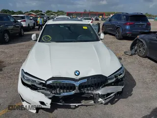 2021 BMW 3 Series 330i with VIN 3MW5R1J00M8B52627, listed as a IAAI auction lot 40722823 with 36,769 mi miles. Bid and sale history available at carsss.com. Image 6.