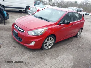 2012 Hyundai Accent SE with VIN KMHCU5AE8CU018361, listed as a IAAI auction lot 42050938 with 133,688 mi miles. Bid and sale history available at carsss.com. Image 2.