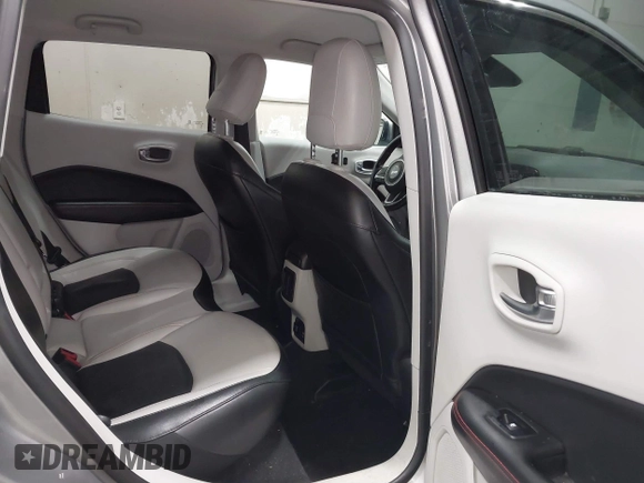 2020 Jeep Compass Limited with VIN 3C4NJDCB6LT148085, listed as a IAAI auction lot 41537903 with 55,878 mi miles and . Bid and sale history available at carsss.com. Image 8.