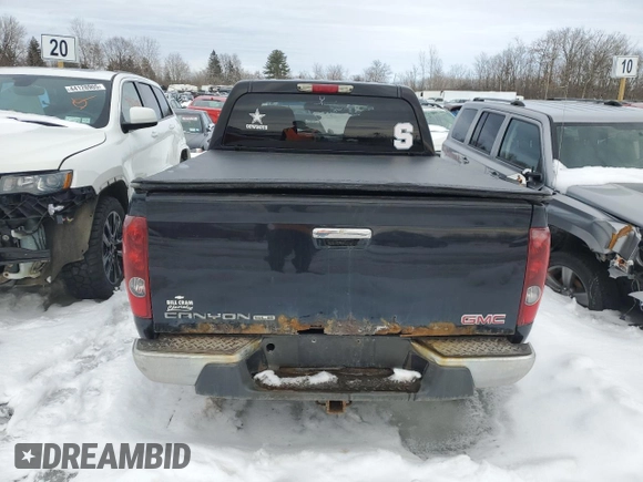 2011 GMC Canyon SLE1 with VIN 1GTH6MFE1B8124553, listed as a Copart auction lot 46122415 with 176,763 mi miles and Salvage title. Bid and sale history available at DreamBid. Image 6.