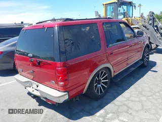 1999 Ford Expedition XLT with VIN 1FMRU17LXXLC35575, listed as a IAAI auction lot 42820162 with 166,172 mi miles and . Bid and sale history available at DreamBid. Image 4.