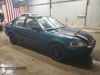 1997 Honda Civic DX with VIN 1HGEJ6529VL024076, listed as a Copart auction lot 74904484 with 203,570 mi miles and Salvage Title. Bid and sale history available at carsss.com. Image 4.