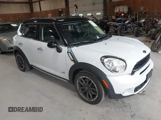 2015 MINI Countryman S with VIN WMWZC5C56FWP43459, listed as a IAAI auction lot 42603313 with 121,535 mi miles and . Bid and sale history available at DreamBid. Image 1.