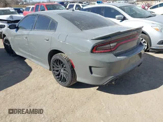 2019 Dodge Charger R/T z VIN 2C3CDXCTXKH607784, wystawiony jako IAAI lot #41667401 z przebiegiem 120 644 mil mil oraz . Historia ofert i sprzedaży dostępna na DreamBid. Obrazek 3.