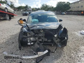 2022 Tesla Model 3 with VIN 5YJ3E1EA2NF124334, listed as a Copart auction lot 45390715 with 25,861 mi miles and Salvage Title. Bid and sale history available at carsss.com. Image 5.