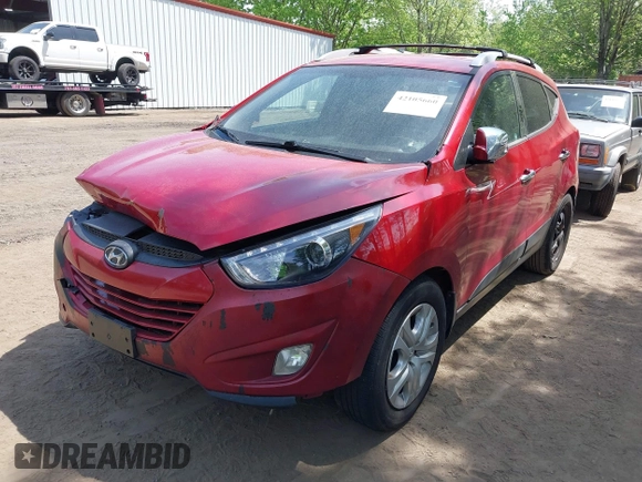 2013 Hyundai Tucson GLS with VIN KM8JU3AC9DU699108, listed as a IAAI auction lot 42105660 with 144,703 mi miles. Bid and sale history available at carsss.com. Image 2.