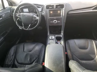 2017 Ford Fusion Titanium with VIN 3FA6P0K92HR335392, listed as a Copart auction lot 47507844 with 125,292 mi miles and Salvage Title. Bid and sale history available at carsss.com. Image 8.