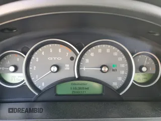 2004 Pontiac GTO with VIN 6G2VX12G74L315052, listed as a Copart auction lot 42952005 with 118,369 mi miles and Salvage Title. Bid and sale history available at carsss.com. Image 9.