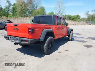 2020 Jeep Gladiator Sport S z VIN 1C6HJTAG0LL149161, wystawiony jako IAAI lot #42071132 z przebiegiem 153 062 mil mil oraz . Historia ofert i sprzedaży dostępna na DreamBid. Obrazek 4.