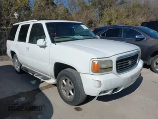 2000 Cadillac Escalade z VIN 1GYEK13R9YR149637, wystawiony jako IAAI lot #41599887 z przebiegiem 206 835 mil mil oraz . Historia ofert i sprzedaży dostępna na DreamBid. Obrazek 1.