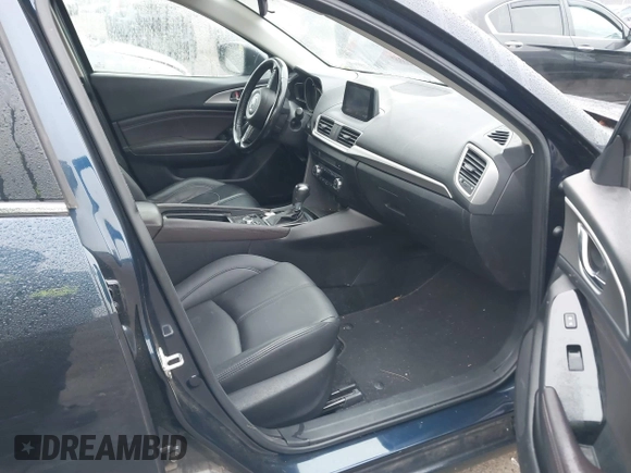 2018 Mazda 3 Touring with VIN 3MZBN1L34JM204883, listed as a IAAI auction lot 41094541 with 125,205 mi miles and . Bid and sale history available at DreamBid. Image 5.