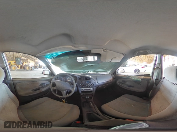 2001 Mitsubishi Mirage ES z VIN JA3AY26CX1U013535, wystawiony jako Copart lot #57664885 z przebiegiem 159 095 mil mil oraz Szkoda całkowita • Salvage title. Historia ofert i sprzedaży dostępna na DreamBid. Obrazek 14.
