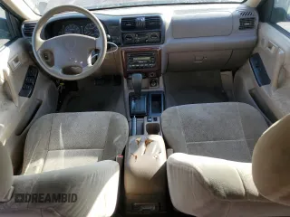 2002 Isuzu Rodeo S with VIN 4S2CK58W324325318, listed as a Copart auction lot 78851294 with 166,323 mi miles and Salvage Title. Bid and sale history available at DreamBid. Image 8.