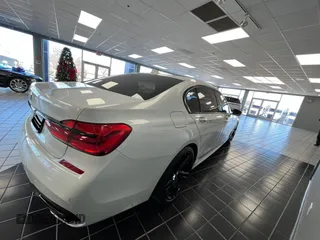 2018 BMW 7 Series 740i with VIN WBA7E2C50JG743251, listed as a Copart auction lot 87849025 with 60,974 mi miles and Clean Title. Bid and sale history available at carsss.com. Image 4.