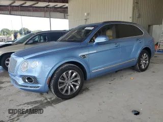 2017 Bentley Bentayga W12 z VIN SJAAC2ZV1HC014040, wystawiony jako Copart lot #88814295 z przebiegiem 16 709 mil mil oraz Szkody całkowita. Historia ofert i sprzedaży dostępna na DreamBid. Obrazek 1.