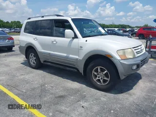 2002 Mitsubishi Montero Limited z VIN JA4MW51R82J060397, wystawiony jako IAAI lot #42343483 z przebiegiem 148 058 mil mil oraz . Historia ofert i sprzedaży dostępna na DreamBid. Obrazek 1.
