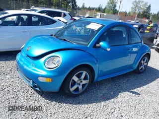 2004 Volkswagen New Beetle Coupe Satellite Blue with VIN 3VWGK31C14M420613, listed as a IAAI auction lot 42046048 with 117,274 mi miles. Bid and sale history available at carsss.com. Image 17.
