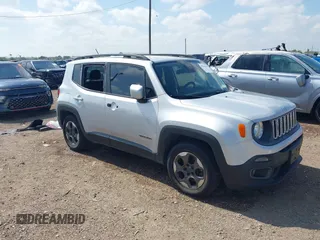 2015 Jeep Renegade Latitude with VIN ZACCJABH0FPB65461, listed as a IAAI auction lot 39756561 with 132,135 mi miles. Bid and sale history available at carsss.com. Image 1.
