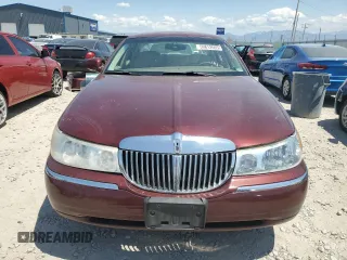 2000 Lincoln Town Car Signature with VIN 1LNHM82W2YY809189, listed as a Copart auction lot 59812665 with 148,236 mi miles and Salvage title. Bid and sale history available at DreamBid. Image 5.