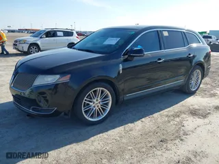 2014 Lincoln MKT EcoBoost with VIN 2LMHJ5AT3EBL56146, listed as a IAAI auction lot 41592528 with 141,688 mi miles. Bid and sale history available at carsss.com. Image 17.