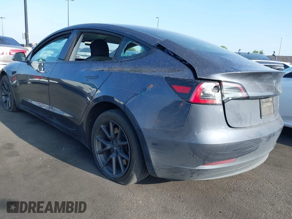 2023 Tesla Model 3 with VIN 5YJ3E1EA4PF427022, listed as a IAAI auction lot 42465964 with 169,346 mi miles and . Bid and sale history available at DreamBid. Image 3.