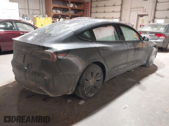 2025 Tesla Model 3 Long Range with VIN 5YJ3E1EA4SF913869, listed as a IAAI auction lot 41416608 with 1,141 mi miles and . Bid and sale history available at DreamBid. Image 4.