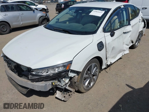 2019 Honda Clarity with VIN JHMZC5F1XKC007033, listed as a IAAI auction lot 42064611 with 28,458 mi miles. Bid and sale history available at carsss.com. Image 6.