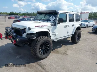 2020 Jeep Wrangler Unlimited Sahara with VIN 1C4HJXEN7LW213459, listed as a IAAI auction lot 41502047 with 40,816 mi miles. Bid and sale history available at carsss.com. Image 17.
