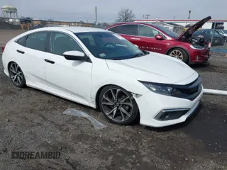 2021 Honda Civic Sedan LX with VIN 2HGFC2F67MH514651, listed as a IAAI auction lot 41828501 with 57,185 mi miles. Bid and sale history available at carsss.com. Image 1.