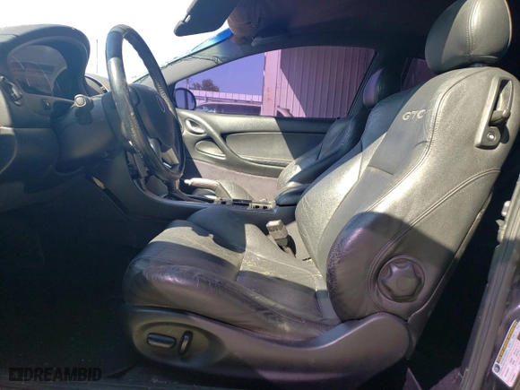 2004 Pontiac GTO with VIN 6G2VX12G04L200129, listed as a Copart auction lot 71822564 with 124,155 mi miles and Salvage Title. Bid and sale history available at carsss.com. Image 7.