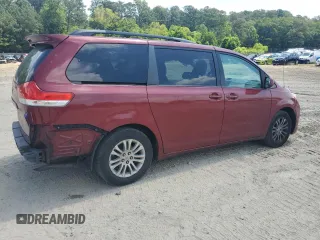 2012 Toyota Sienna XLE AAS z VIN 5TDYK3DC9CS243892, wystawiony jako Copart lot #61198555 z przebiegiem 129 061 mil mil oraz Nie do naprawy • Non repairable. Historia ofert i sprzedaży dostępna na DreamBid. Obrazek 3.