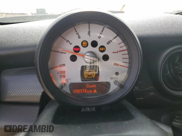 2013 MINI Hardtop S with VIN WMWSV3C54DT478670, listed as a Copart auction lot 52710445 with 58,974 mi miles and Salvage title. Bid and sale history available at DreamBid. Image 9.