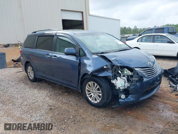 2015 Toyota Sienna XLE with VIN 5TDYK3DC1FS594123, listed as a IAAI auction lot 41944711 with 208,249 mi miles. Bid and sale history available at carsss.com. Image 1.