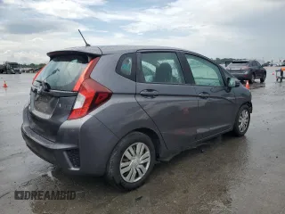 2015 Honda Fit LX с VIN 3HGGK5G59FM731945, выставлен на аукционе Copart как лот 61272285 с пробегом 126 060 миль миль и Списание • Salvage title. История ставок и продаж доступна на DreamBid. Изображение 3.