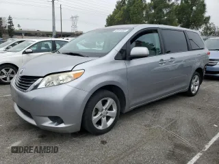 2012 Toyota Sienna with VIN 5TDKA3DC4CS014867, listed as a Copart auction lot 43191655 with 169,517 mi miles and Salvage Title. Bid and sale history available at DreamBid. Image 1.