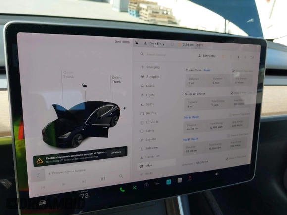 2019 Tesla Model 3 Mid Range with VIN 5YJ3E1EA2KF305834, listed as a IAAI auction lot 41719610 with 126,333 mi miles and . Bid and sale history available at DreamBid. Image 18.