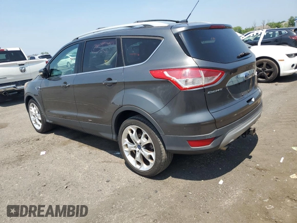 2015 Ford Escape Titanium z VIN 1FMCU9J97FUA38731, wystawiony jako Copart lot #60621085 z przebiegiem 119 704 mil mil oraz Szkoda całkowita • Salvage title. Historia ofert i sprzedaży dostępna na DreamBid. Obrazek 2.
