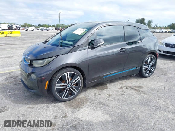2014 BMW i3 z VIN WBY1Z4C56EVX63285, wystawiony jako IAAI lot #41672245 z przebiegiem 70 229 mil mil oraz . Historia ofert i sprzedaży dostępna na DreamBid. Obrazek 2.