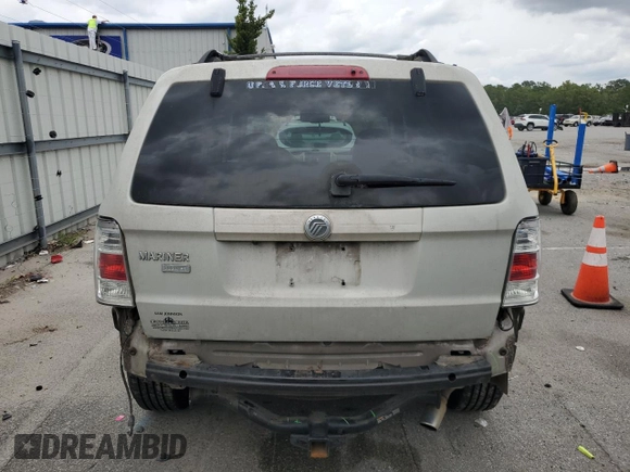 2009 Mercury Mariner Premier with VIN 4M2CU87GX9KJ20726, listed as a Copart auction lot 58690305 with 174,698 mi miles and Salvage title. Bid and sale history available at DreamBid. Image 6.