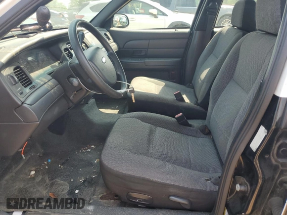 2007 Ford Police Interceptor z VIN 2FAFP71WX7X156954, wystawiony jako Copart lot #60929015 z przebiegiem 174 531 mil mil oraz Szkoda całkowita • Salvage title. Historia ofert i sprzedaży dostępna na DreamBid. Obrazek 7.