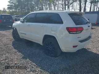 2018 Jeep Grand Cherokee Altitude with VIN 1C4RJFAG4JC309523, listed as a IAAI auction lot 42159534 with 86,682 mi miles and . Bid and sale history available at DreamBid. Image 3.