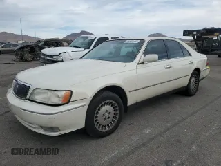 1998 Infiniti Q45 z VIN JNKBY31A8WM403038, wystawiony jako Copart lot #86904484 z przebiegiem 136 142 mil mil oraz Szkody całkowita. Historia ofert i sprzedaży dostępna na DreamBid. Obrazek 1.