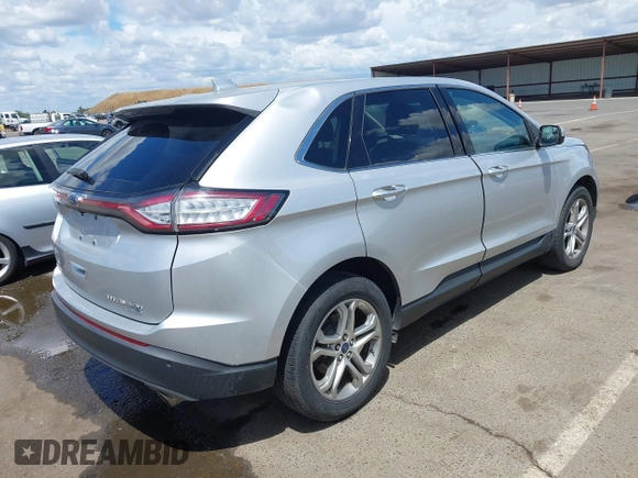 2015 Ford Edge Titanium z VIN 2FMTK4K95FBB47962, wystawiony jako IAAI lot #42234894 z przebiegiem Nie podano mil oraz . Historia ofert i sprzedaży dostępna na DreamBid. Obrazek 4.