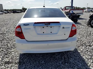 2010 Ford Fusion Hybrid с VIN 3FADP0L3XAR142883, выставлен на аукционе Copart как лот 64308015 с пробегом 67 890 миль миль и Чистый • Clean title. История ставок и продаж доступна на DreamBid. Изображение 6.