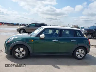 2016 MINI Hardtop 4 Door with VIN WMWXU1C52G2D10035, listed as a IAAI auction lot 42190544 with 106,383 mi miles and . Bid and sale history available at DreamBid. Image 14.
