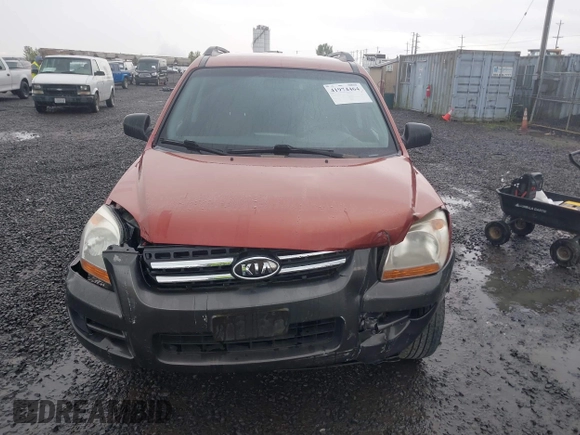 2006 Kia Sportage LX with VIN KNDJE723167159809, listed as a IAAI auction lot 41974464 with 130,822 mi miles and . Bid and sale history available at DreamBid. Image 12.