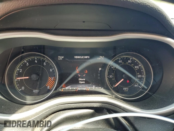2014 Jeep Cherokee Trailhawk with VIN 1C4PJMBS1EW242527, listed as a Copart auction lot 53160485 with 104,074 mi miles and Salvage Title. Bid and sale history available at carsss.com. Image 9.