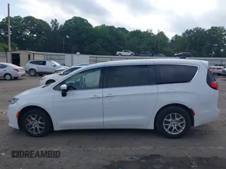 2023 Chrysler Pacifica Touring L with VIN 2C4RC1BG8PR535446, listed as a IAAI auction lot 42307923 with 65,718 mi miles and . Bid and sale history available at DreamBid. Image 14.